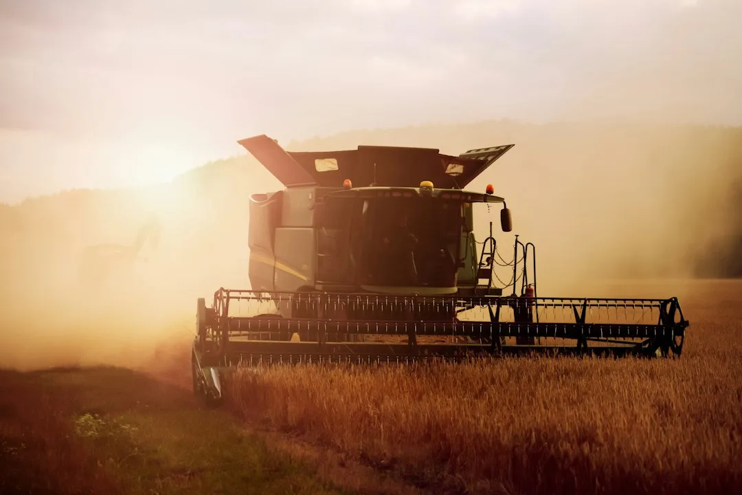 Grain moisture correction applied to corn yield monitor harvest records